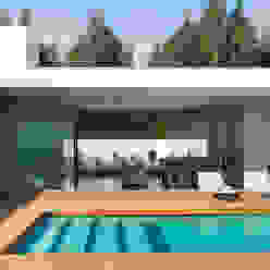 Vista da piscina para a sala A.As, Arquitectos Associados, Lda Piscinas modernas