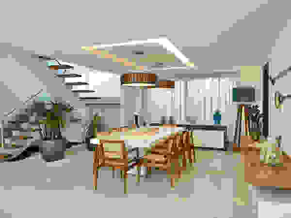 Pinheiro Martinez Arquitetura Modern dining room Wood White