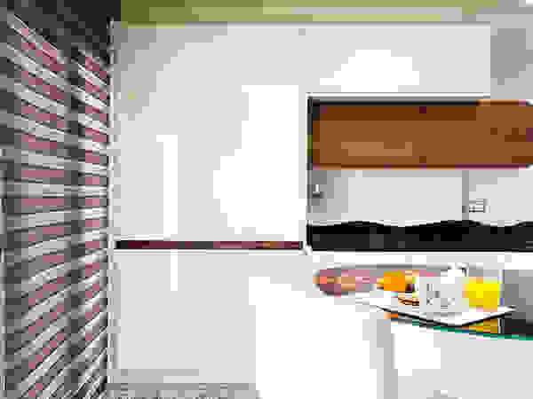 Espacios y Luz Fotografía KitchenCabinets & shelves