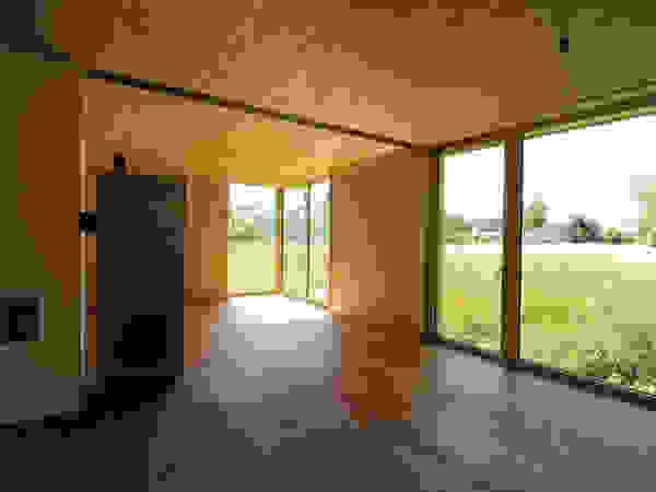 Symbios Architektur Modern living room Wood Brown
