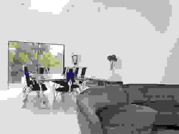 Ice White House-Luxury home Quirke McNamara Minimalist dining room Purple/Violet