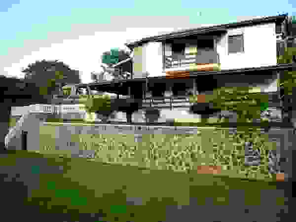 CHASTINET ARQUITETURA URBANISMO ENGENHARIA LTDA Country style house Bricks Wood effect