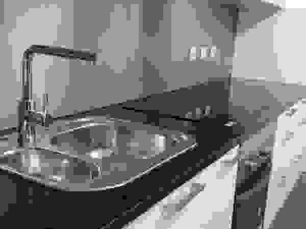 Atádega Sociedade de Construções, Lda Modern Kitchen Stone Black