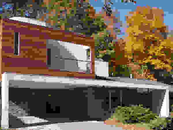 RT Studio, LLC Moderne huizen Hout