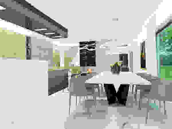 4Q DEKTON Pracownia Architektoniczna Modern dining room Concrete White