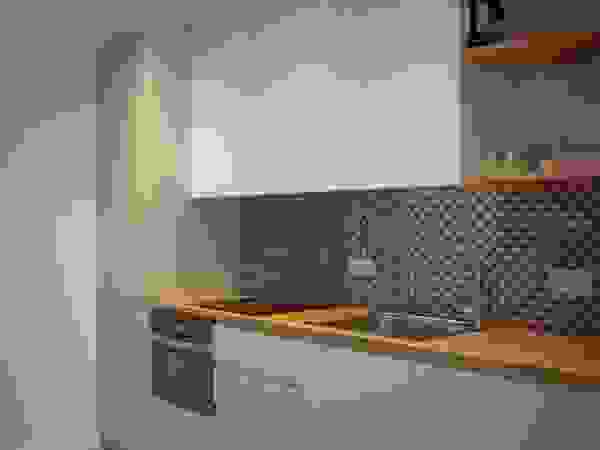 osb arquitectos Built-in kitchens Green