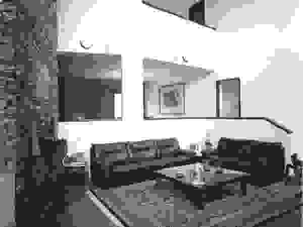 OMAR SEIJAS, ARQUITECTO Rustic style house