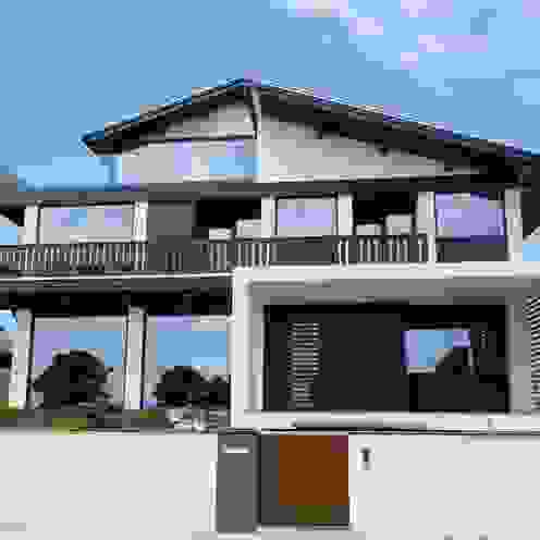 Alçado Principal GAAPE - ARQUITECTURA, PLANEAMENTO E ENGENHARIA, LDA Casas ecléticas Casa de praia,depois,fachada de vidro,aluminio,exterior de madeira
