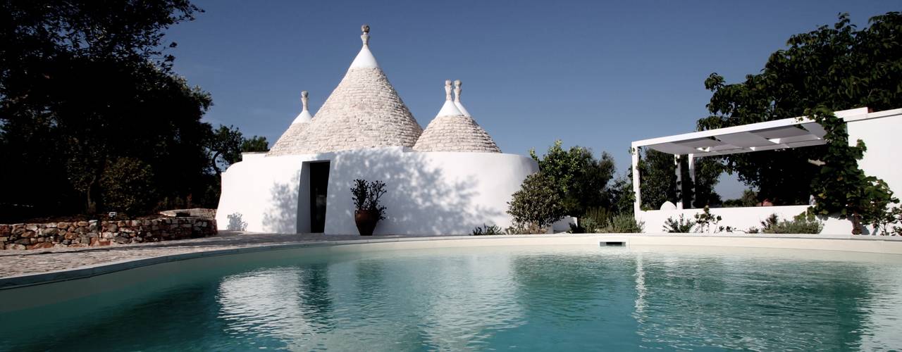 I TRULLI DI RULA E JIM, ARKITETTI Flore-Venezia ARKITETTI Flore-Venezia カントリースタイルの プール