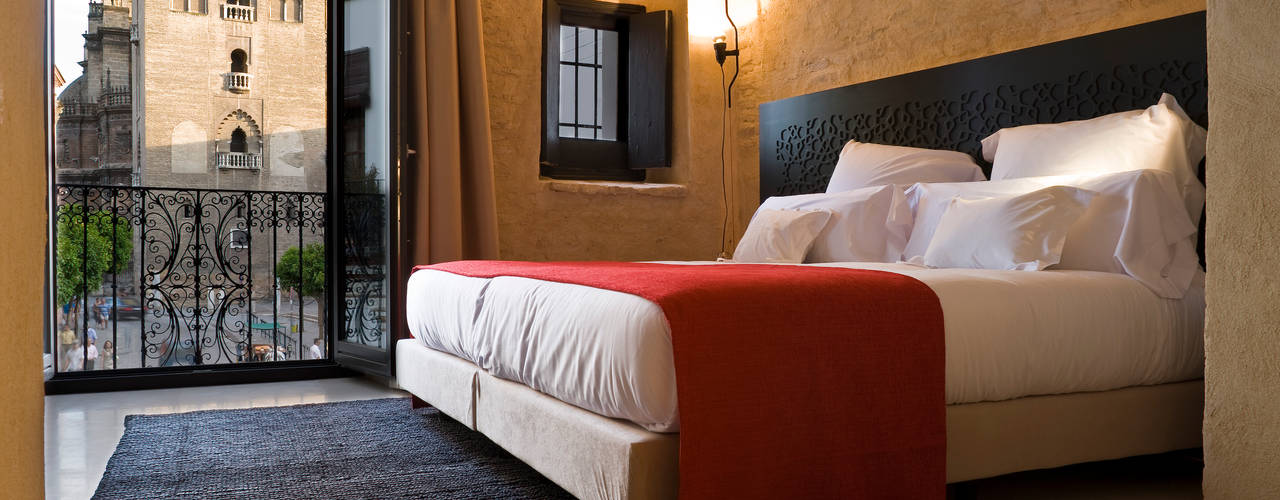Hotel EME in Seville, Spain Donaire Arquitectos Спальня в эклектичном стиле