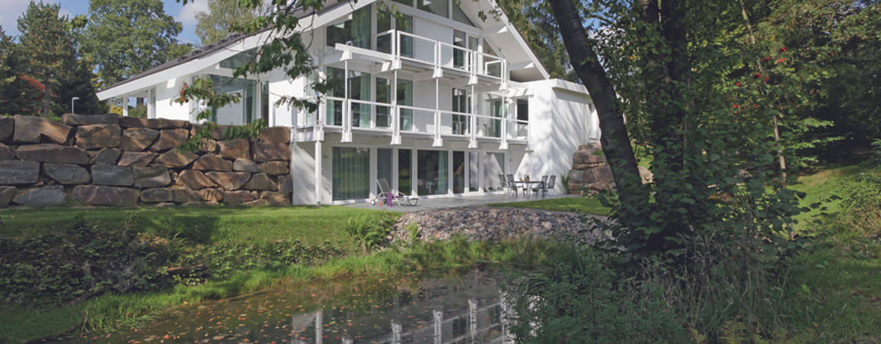 Luxus-Glashaus im Sauerland, DAVINCI HAUS GmbH & Co. KG DAVINCI HAUS GmbH & Co. KG Modern Houses