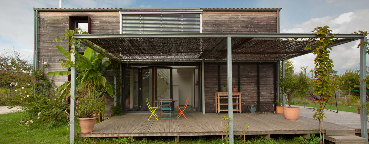 MAISON PASSIVE - TABANAC / GIRONDE, POLY RYTHMIC ARCHITECTURE POLY RYTHMIC ARCHITECTURE Powierzchnie handlowe