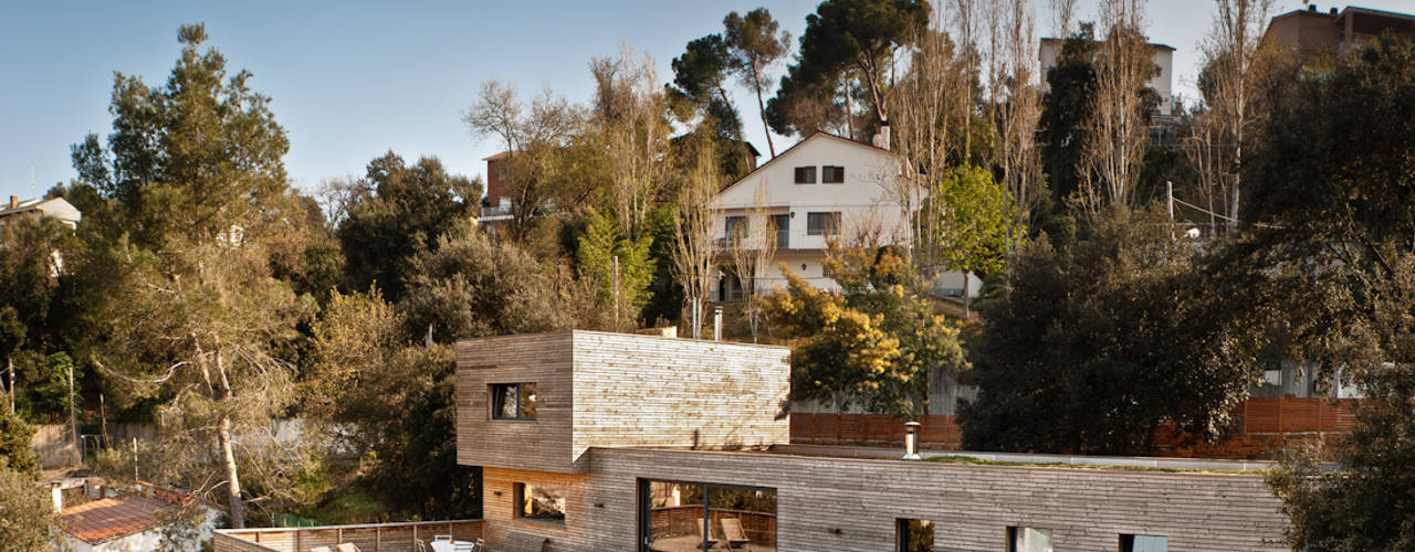 Arquitectura ecológica en Sant Cugat-Barcelona, ecoclay ecoclay Casas modernas