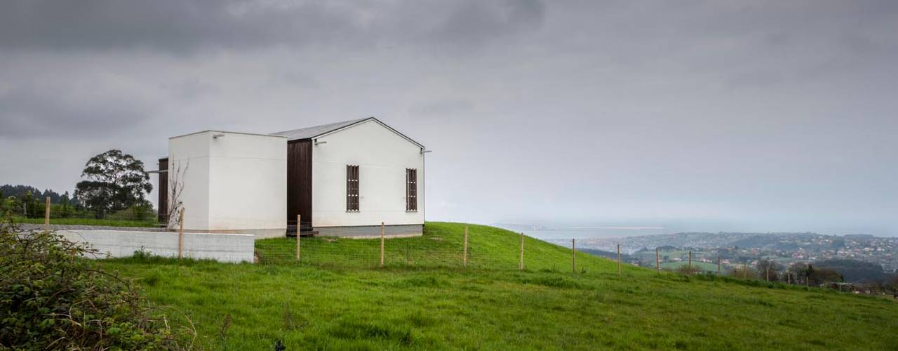 Casa Bioclimática JG, Modulo12 Modulo12 Casas de estilo escandinavo