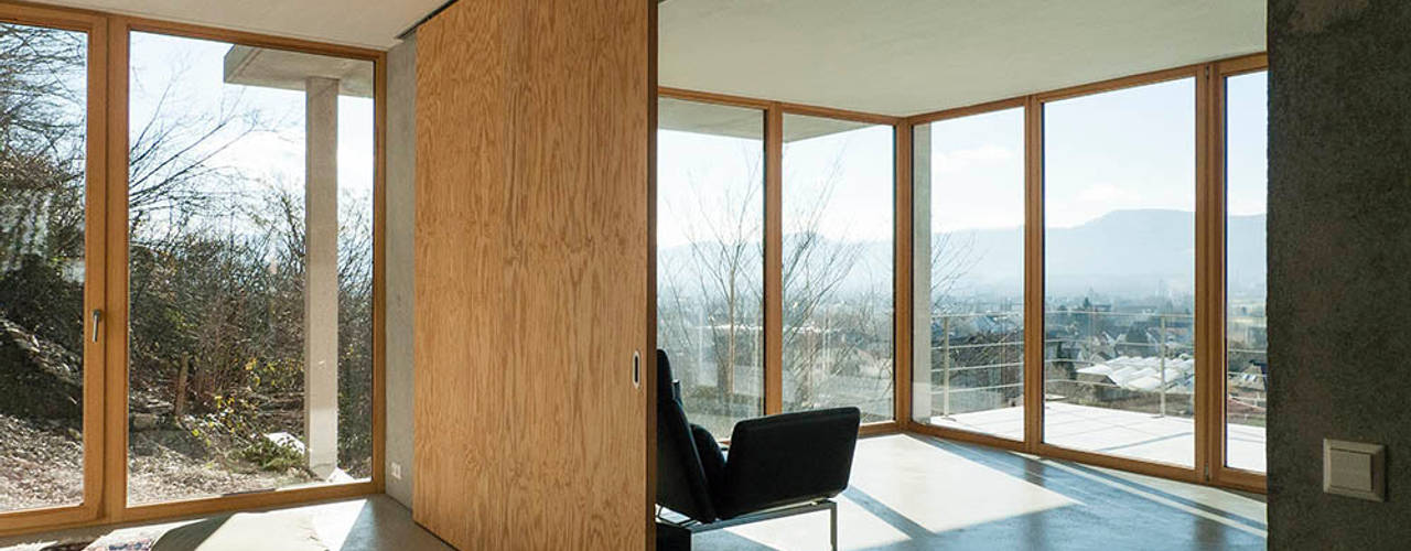 Modernes Traumhaus mit 1a-Aussicht, GIAN SALIS ARCHITEKT GIAN SALIS ARCHITEKT Moderne Fenster & Türen