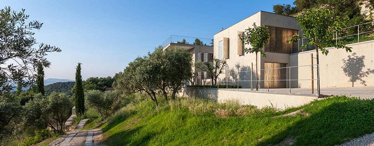 un mur habité, ateliers d'architecture JPB ateliers d'architecture JPB Modern houses