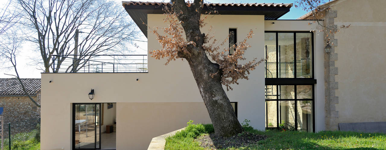 EXTENSION D'UNE MAISON, JOSE MARCOS ARCHITECTEUR JOSE MARCOS ARCHITECTEUR Modern conservatory