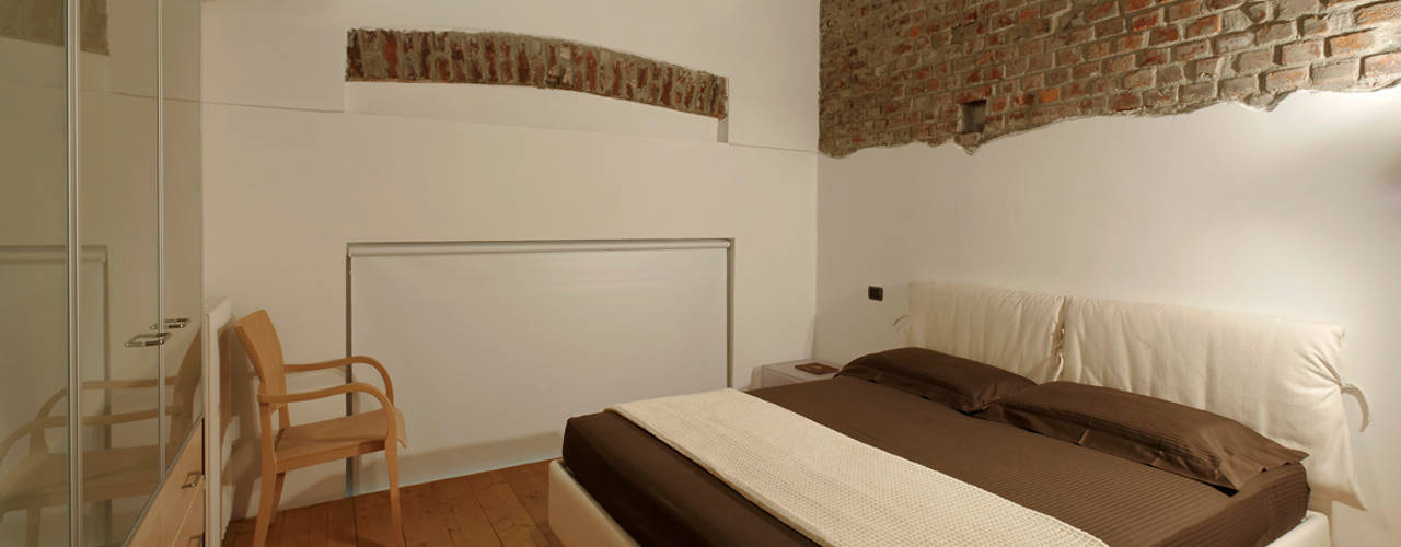 Loft a Milano; zona Ripa Ticinese, Studio Arch. Matteo Calvi Studio Arch. Matteo Calvi غرفة نوم