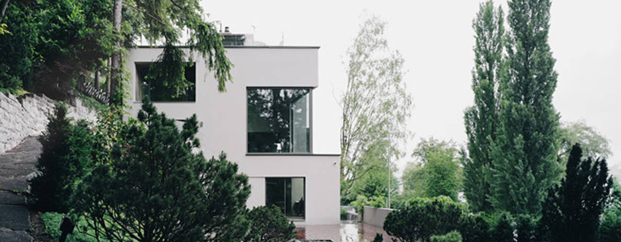 Haus am See, Lando Rossmaier Architekten AG Lando Rossmaier Architekten AG บ้านและที่อยู่อาศัย