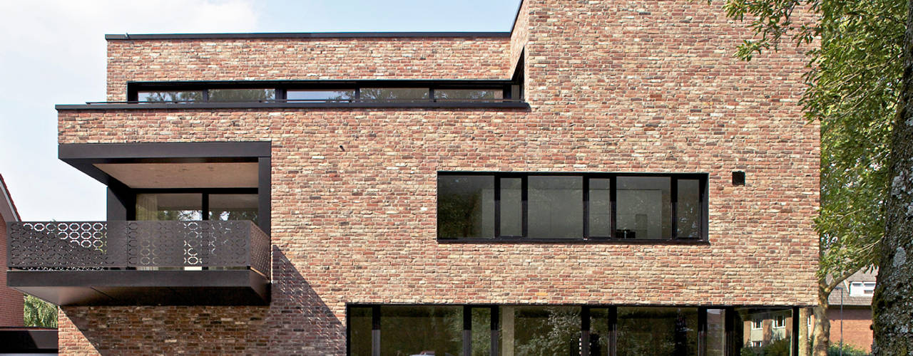 Außergewöhnlicher Kubus: Haus Strathmann Münster, Andreas Heupel Architekten BDA Andreas Heupel Architekten BDA Дома в стиле модерн