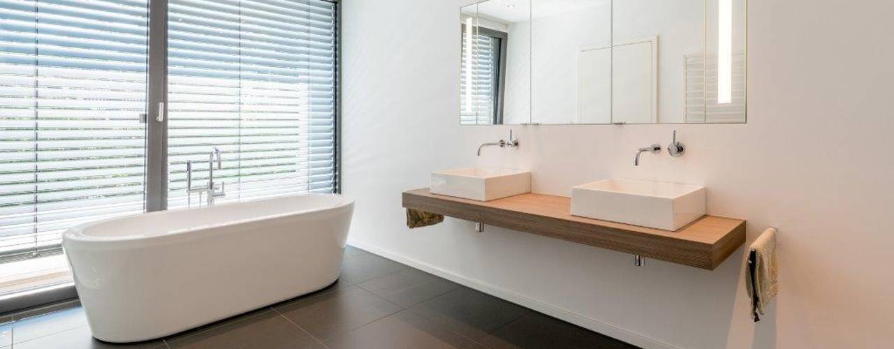 Haus C, K6architekten K6architekten Bagno minimalista