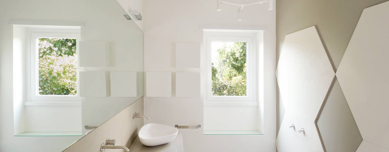 Valle dei Casali: Ristrutturazione completa per l’appartamento a Roma, stefania eugeni stefania eugeni Minimalist style bathroom