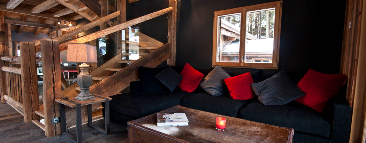 Chalet de Claude: un chalet de luxe, mais distinctif avec un intérieur en rouge et noir, shep&kyles design shep&kyles design Salas de estilo rural