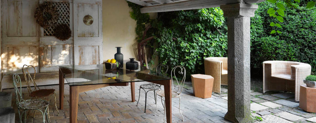 Indoor-Outdoor living spaces in the Country House, CASAMANIA HORM FACTORY OUTLET CASAMANIA HORM FACTORY OUTLET Balcones y terrazas de estilo rural