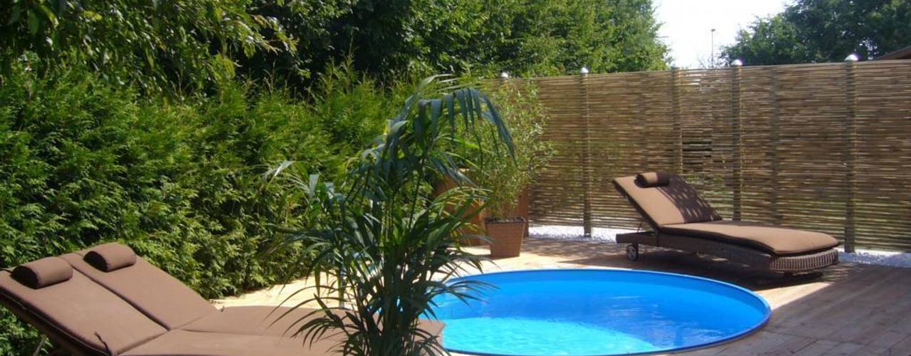 Nachhaltig, stilvoll, vielseitig: moderner Sichtschutz aus Bambus, GH Product Solutions GH Product Solutions Tropical style garden