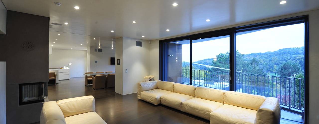 DHM57 Umbau und Zubau eines Einfamilienhouses mit Niederenergieanforderungen., zone architekten zone architekten Modern living room