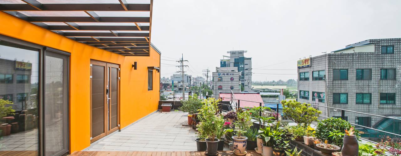 덕산 W-Building, JYA-RCHITECTS JYA-RCHITECTS Balcone, Veranda & Terrazza in stile moderno