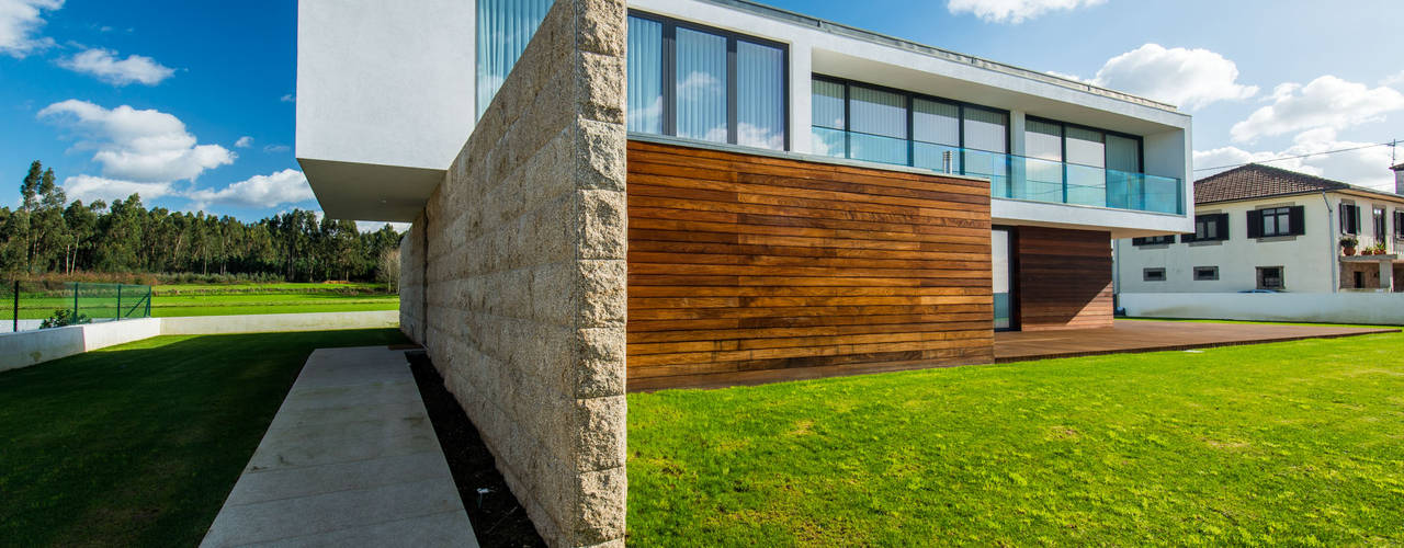 Projeto de arquitetura de casa junto ao mar, a3mais a3mais Casas modernas