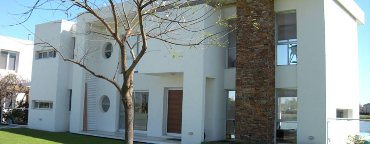 Casa San Isidro Labrador, arqpizzini arqpizzini Moderne huizen