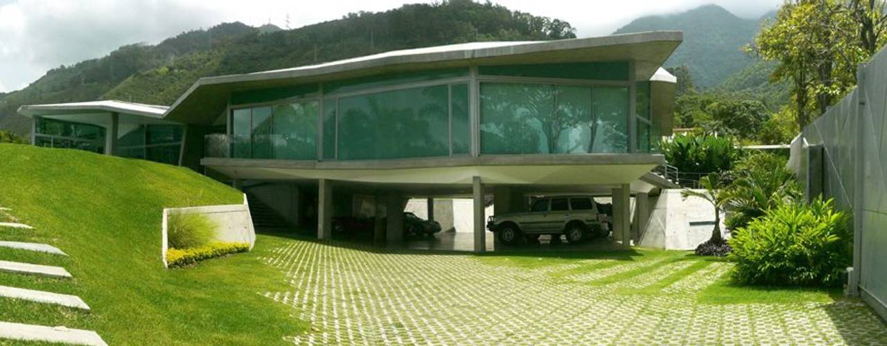 Casa AG, oda - oficina de arquitectura oda - oficina de arquitectura حديقة