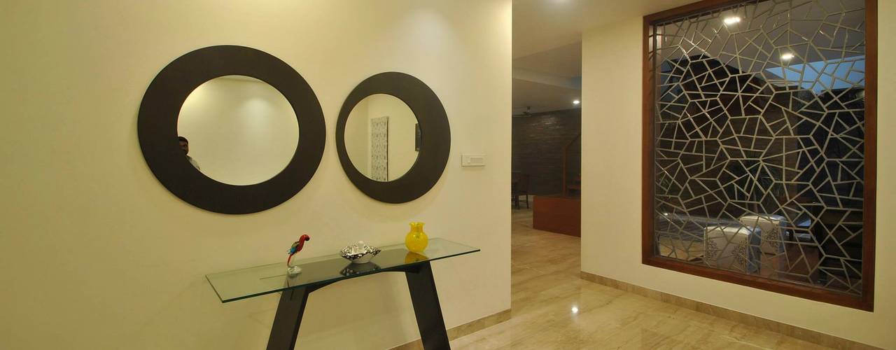 Mr & Mrs Pannerselvam's Residence, Murali architects Murali architects Modern walls & floors