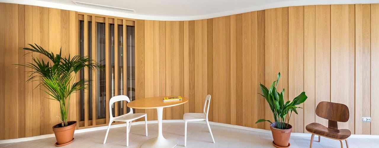 Apartamentos en Paseo de Gracia, Barcelona, THK Construcciones THK Construcciones Modern living room Wood Wood effect