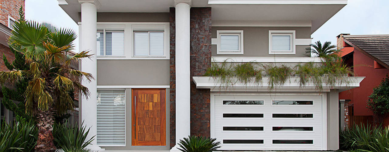 Casa B+E, ANDRÉ PACHECO ARQUITETURA ANDRÉ PACHECO ARQUITETURA Eclectic style houses