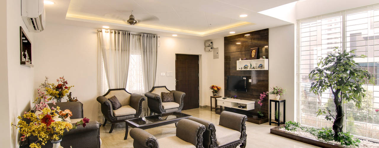 BUDDHA MURAL AND BODHI TREE THEMED INTERIORS FOR A VILLA IN HYDERABAD, KREATIVE HOUSE KREATIVE HOUSE 에클레틱 거실 가죽 그레이