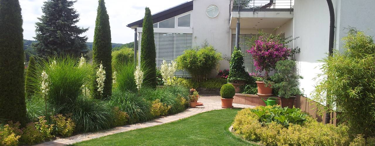 homify Modern style gardens