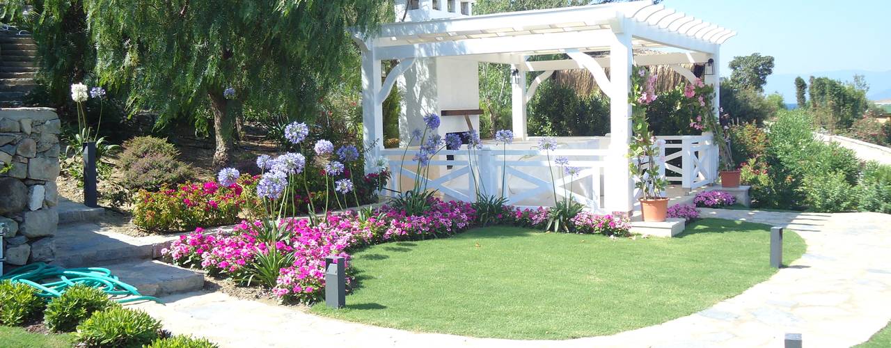 Hebil Villa, Ditto Mimarlık & Tasarım Boutique Ditto Mimarlık & Tasarım Boutique Jardines mediterráneos Madera maciza Multicolor