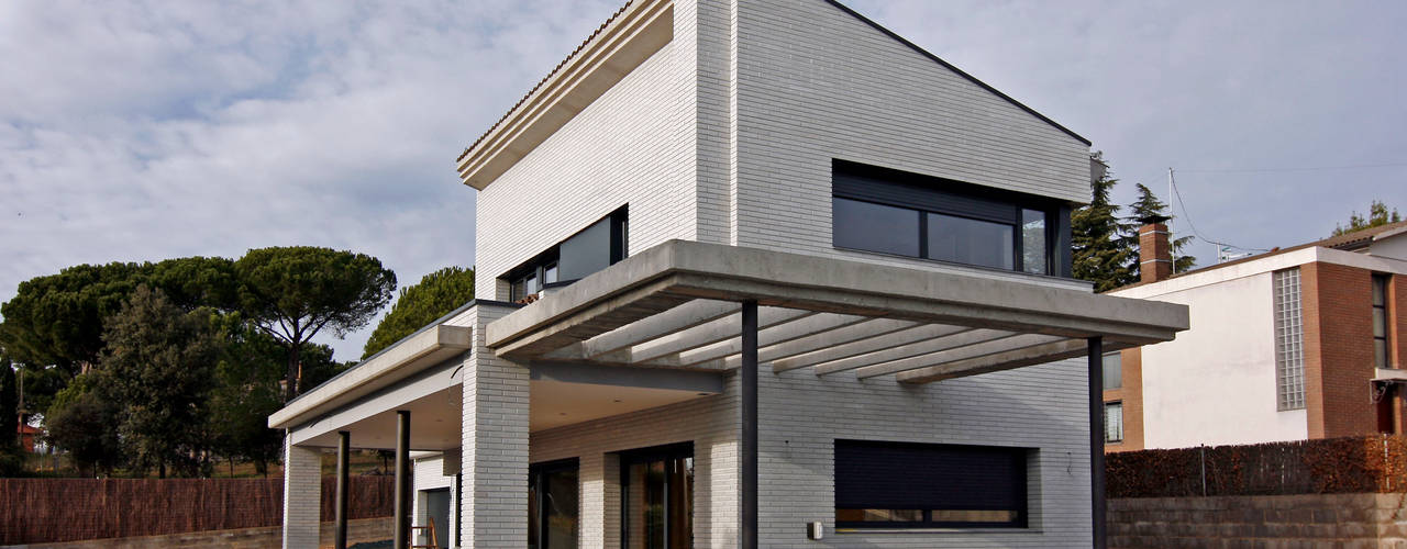 Vivienda en Sant Antoni de Vilamajor , Atres Arquitectes Atres Arquitectes Casas modernas Ladrillos