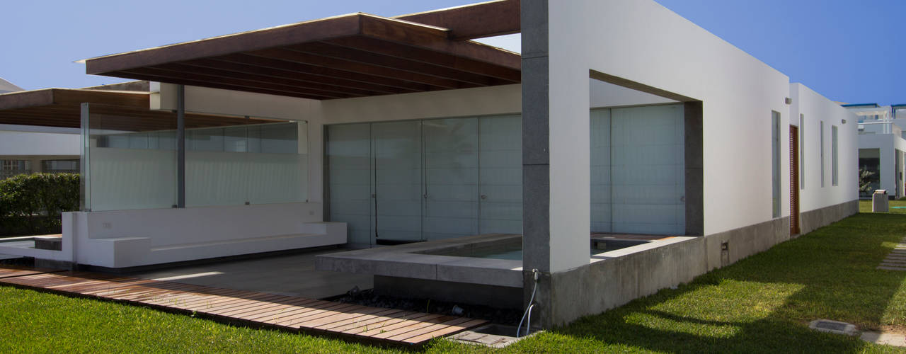 CASA DE PLAYA ARÉVALO, ARKILINEA ARKILINEA Casas de estilo minimalista