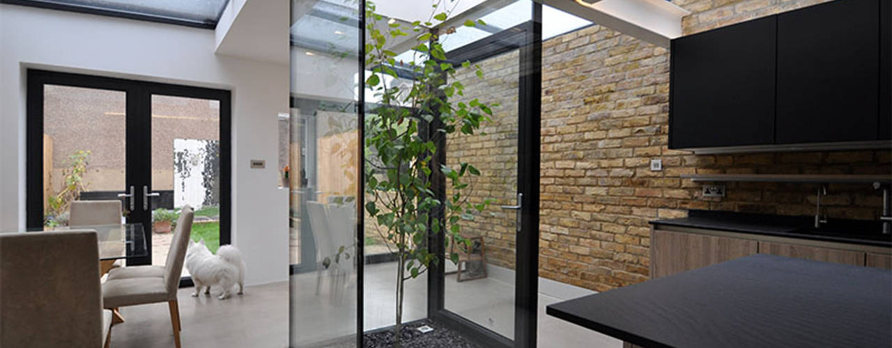 The Courtyard House , Space Group Architects Space Group Architects Modern dining room
