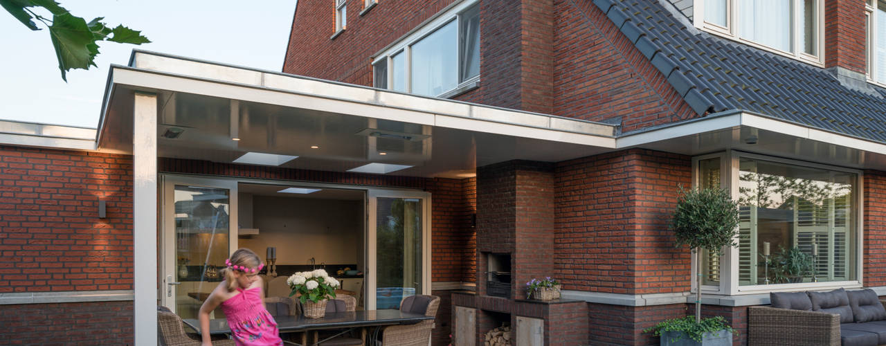 Verbouwing woonhuis Nootdorp, Architect2GO Architect2GO Balkon, Veranda & Terrasse im Landhausstil Stein