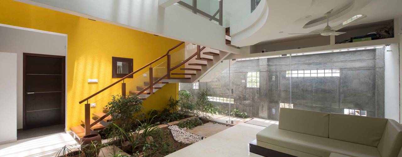 UMA GOPINATH RESIDENCE, Muraliarchitects Muraliarchitects Salas modernas