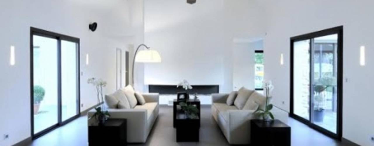 Rénovation d'une maison traditionnelle en maison moderne et luxueuse, Archionline Archionline Living room