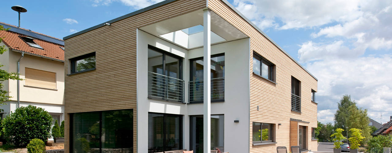 Filigrane Architektur trifft ökologische und modernste Technik, KitzlingerHaus GmbH & Co. KG KitzlingerHaus GmbH & Co. KG Modern houses Engineered Wood Transparent