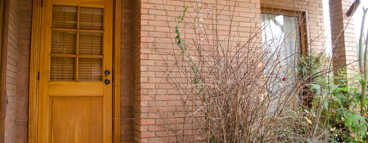 PUERTAS DE MADERA DE LENGA, Ignisterra S.A. Ignisterra S.A. Rustic style windows & doors Wood Wood effect