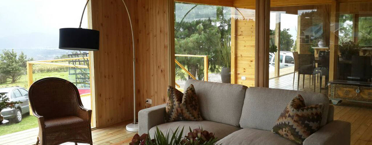 Vivienda suburbana en madera, Taller de Ensamble SAS Taller de Ensamble SAS Modern living room Wood Wood effect