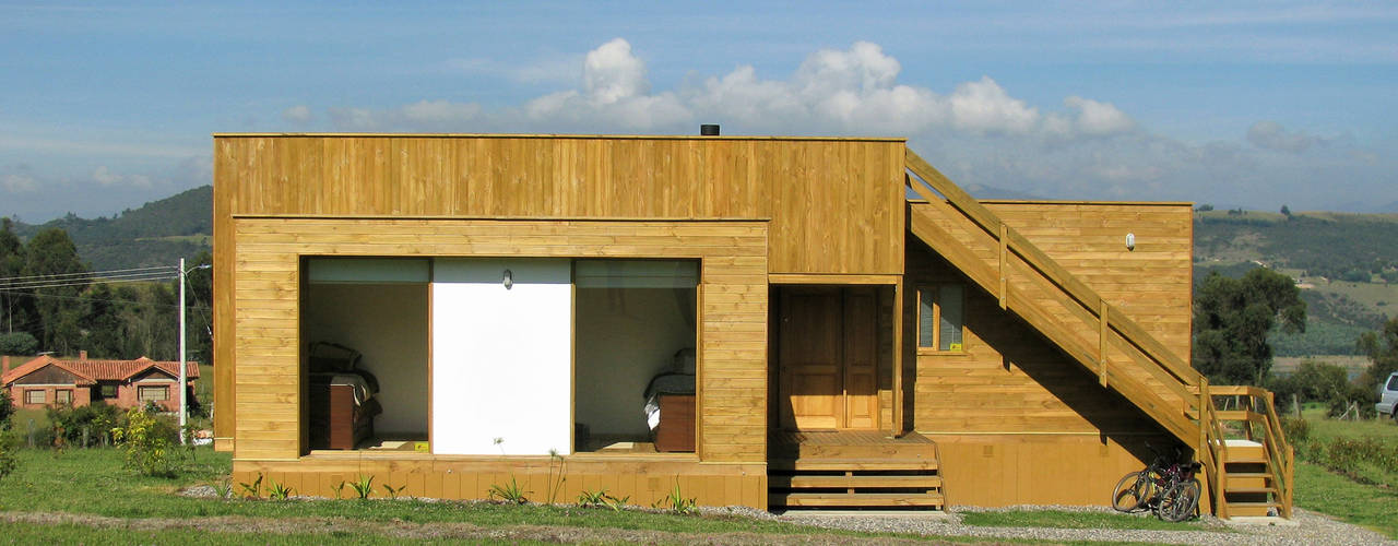Casa cubica madera, Taller de Ensamble SAS Taller de Ensamble SAS Casas modernas: Ideas, imágenes y decoración Madera Acabado en madera